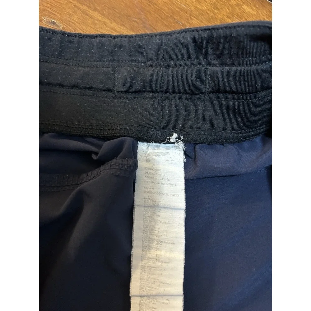 Fabletics Mens Medium Blue Athletic Shorts Unlined 7in Gym Pockets Drawstring